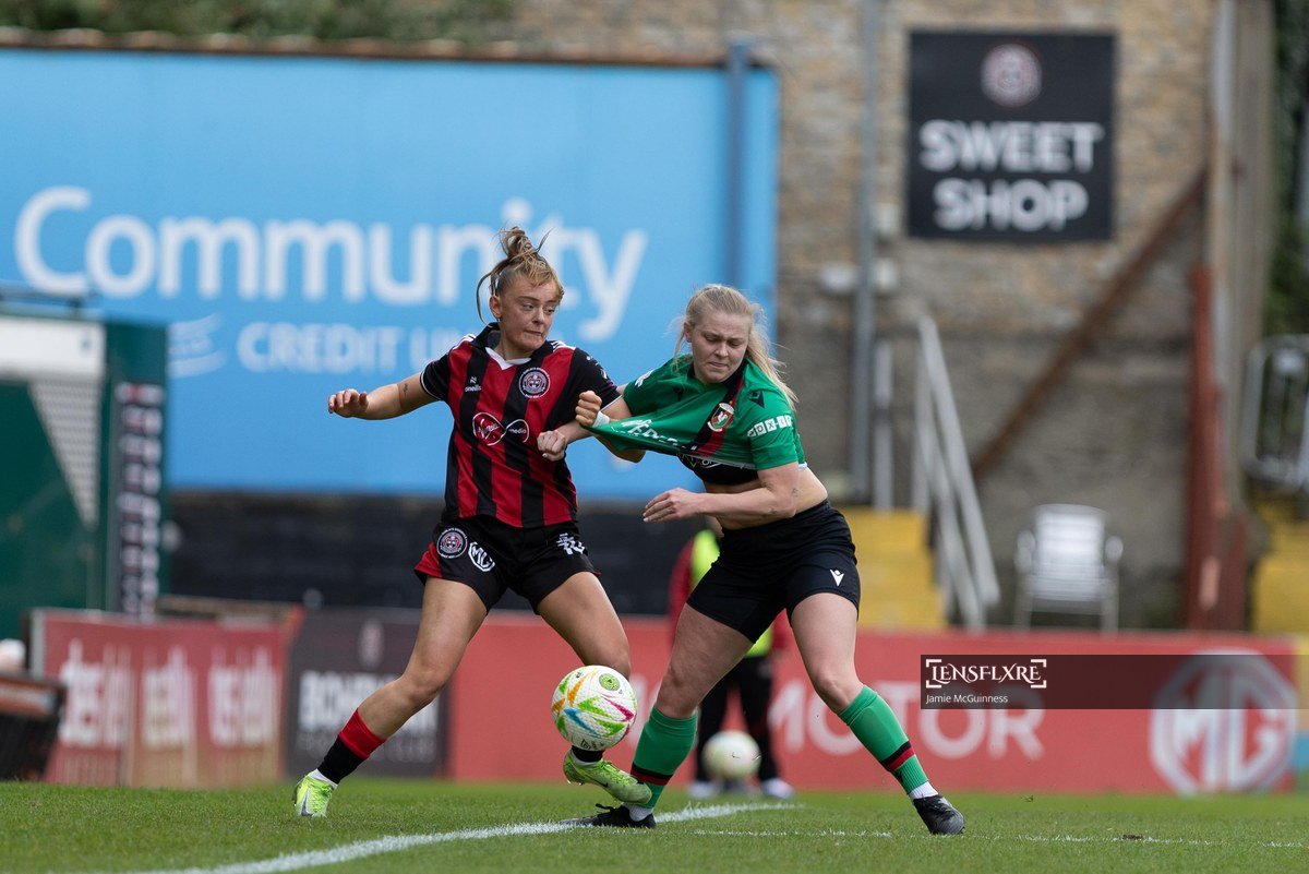 Katie Malone tugs on the jersey of a Glentoran player during the All-Island Cup Group match between Bohemians and Glentoran at Dalymound Park, Dublin.